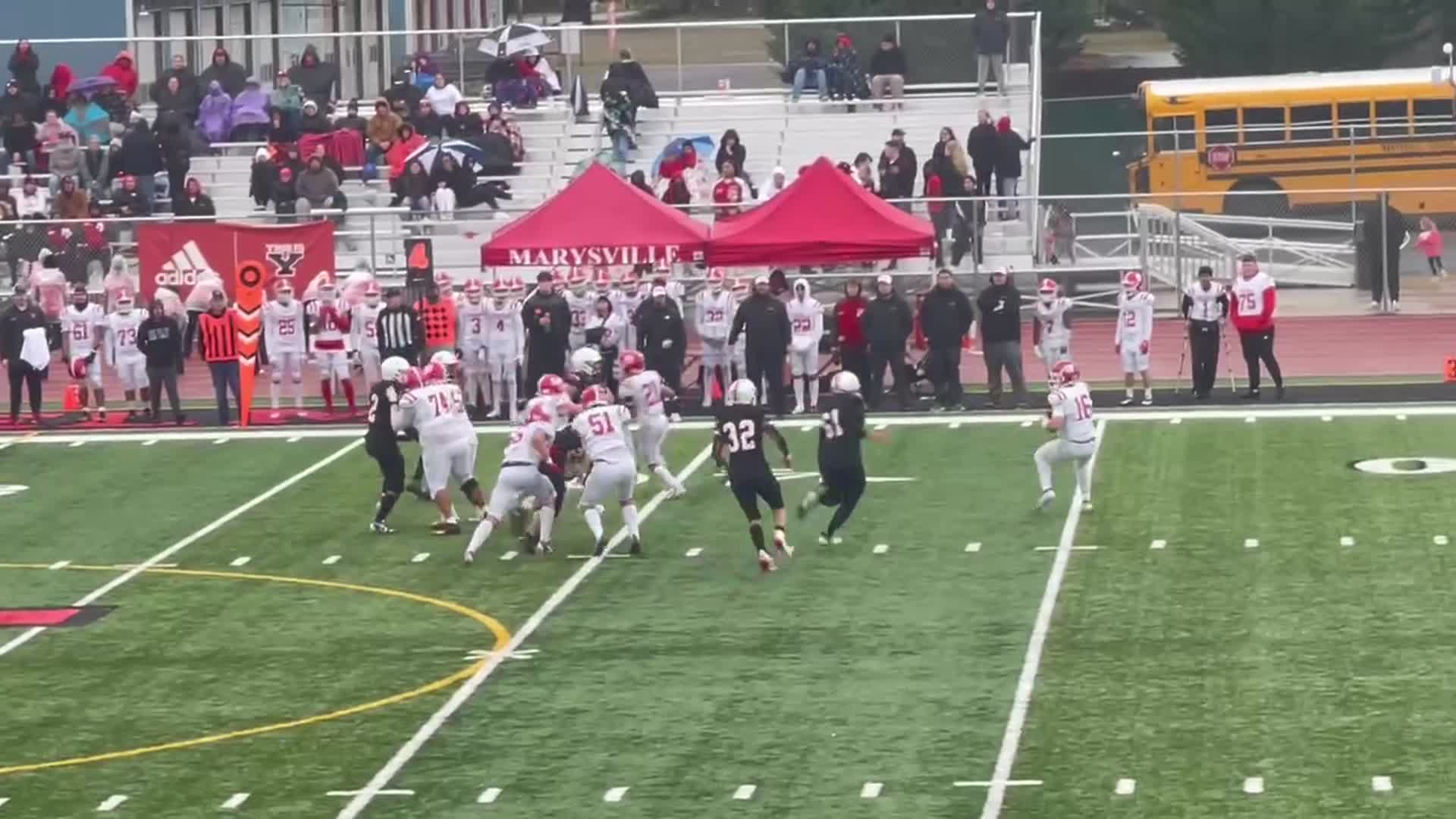 Yelm Defensive pressure by #61 Chris Hauss turnover on downs