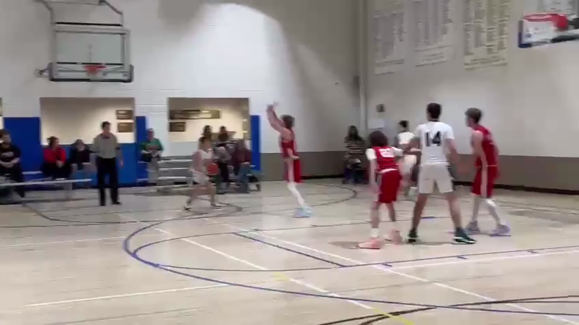 Nitai Martel with the corner three, assisted by Caleb Knoll.