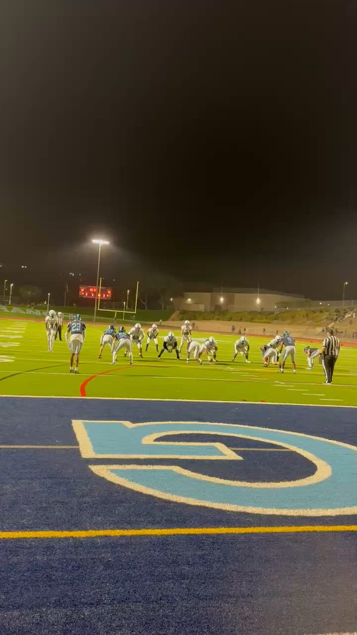 Aj hooker with a hurdle over his lineman to gain 6 for Grossmont