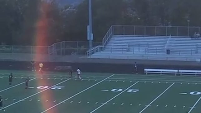 hits ball through defenders legs and speeds past him.