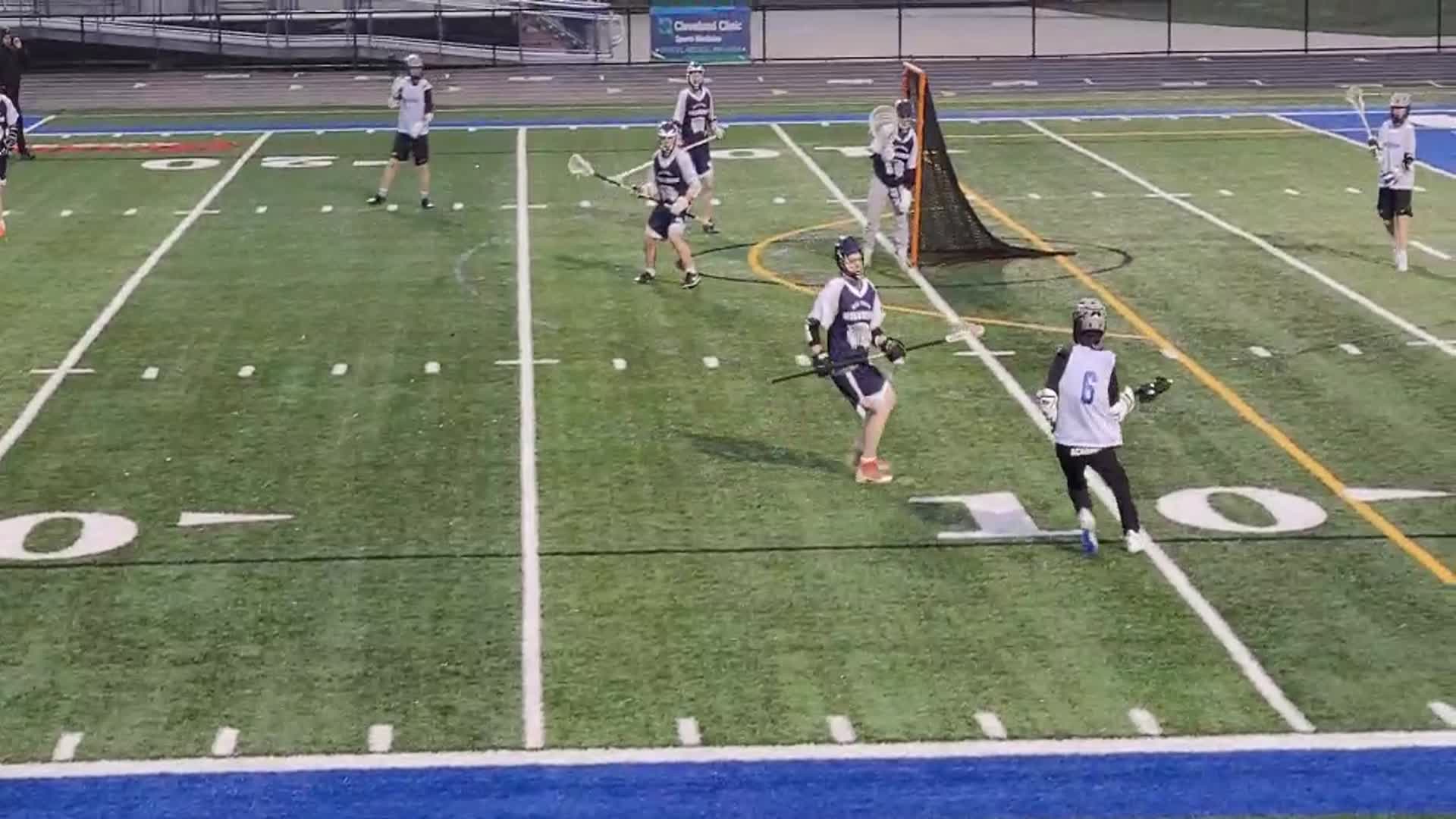 JV lacrosse shot on goal.