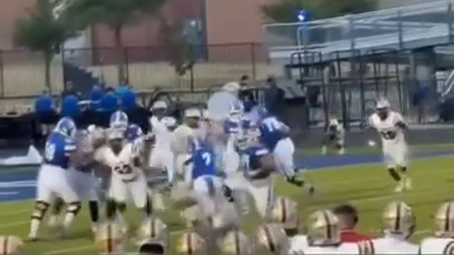 #21 reads his key and meets his opponent in his backfield for a goal line stop.