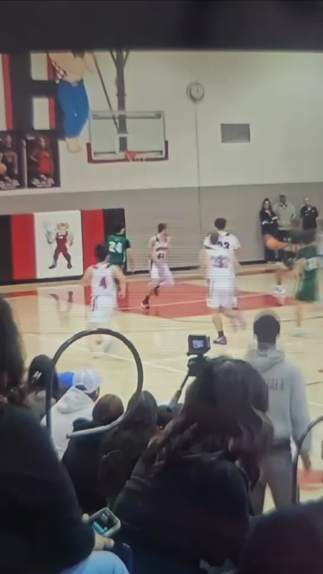 Steal by Raz, Alley-oop pass by Madrid to Raz for a dunk.