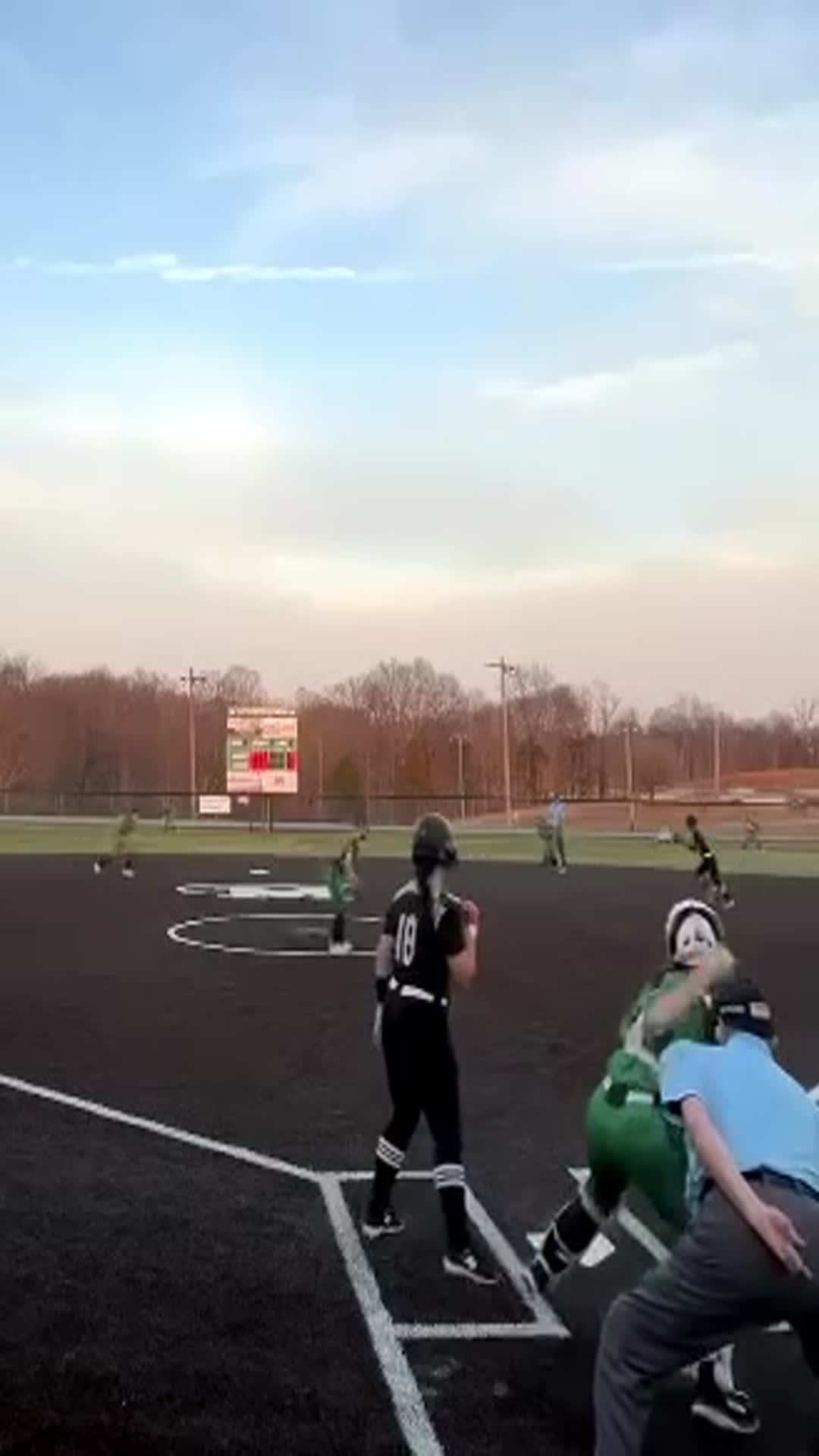 Freshman (Kendall Buchanan) @ short stop receives the ball from Senior (Addi Allen) during a Meade County High School varsity game for the OUT.