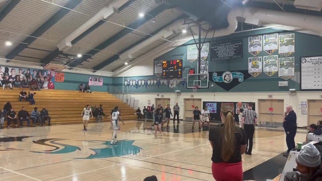 Zoe fakes the pass on a layup and scores for her team.