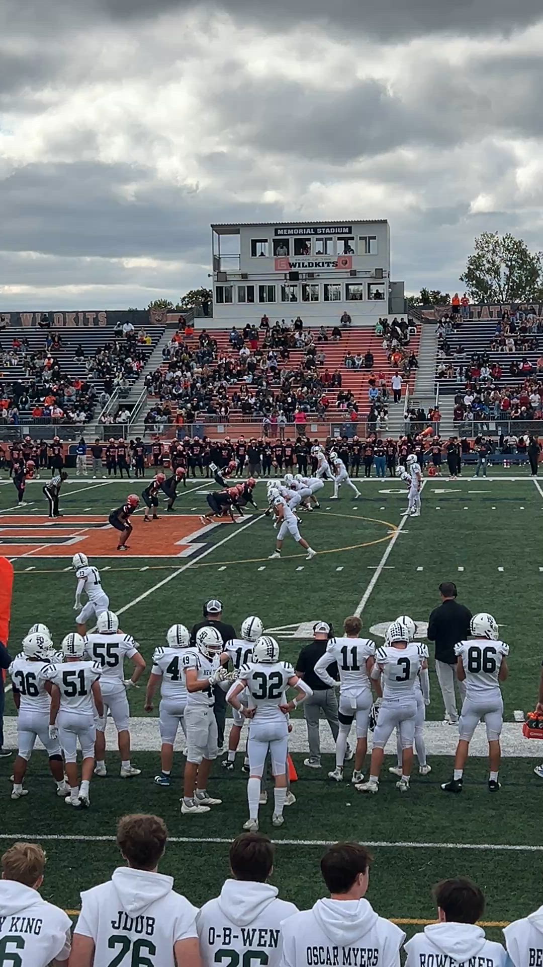 New Trier QB Jackie Ryder completes pass to sophomore RB Nikolas Hanold for an 8-yard gain against Evanston, on way to a 35-6 New Trier win over Evanston.