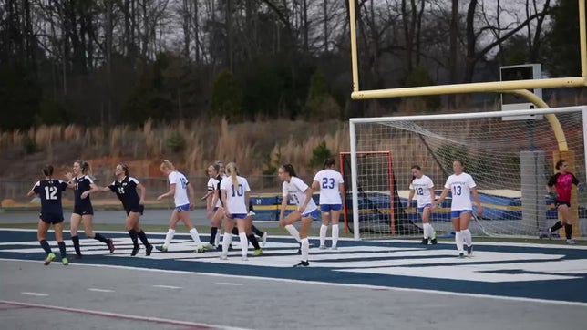 Sophomore #6 Avery Garrett with a corner kick delivery to junior #11 Gracie Hughes against 4A Mooresville. 2-1 win