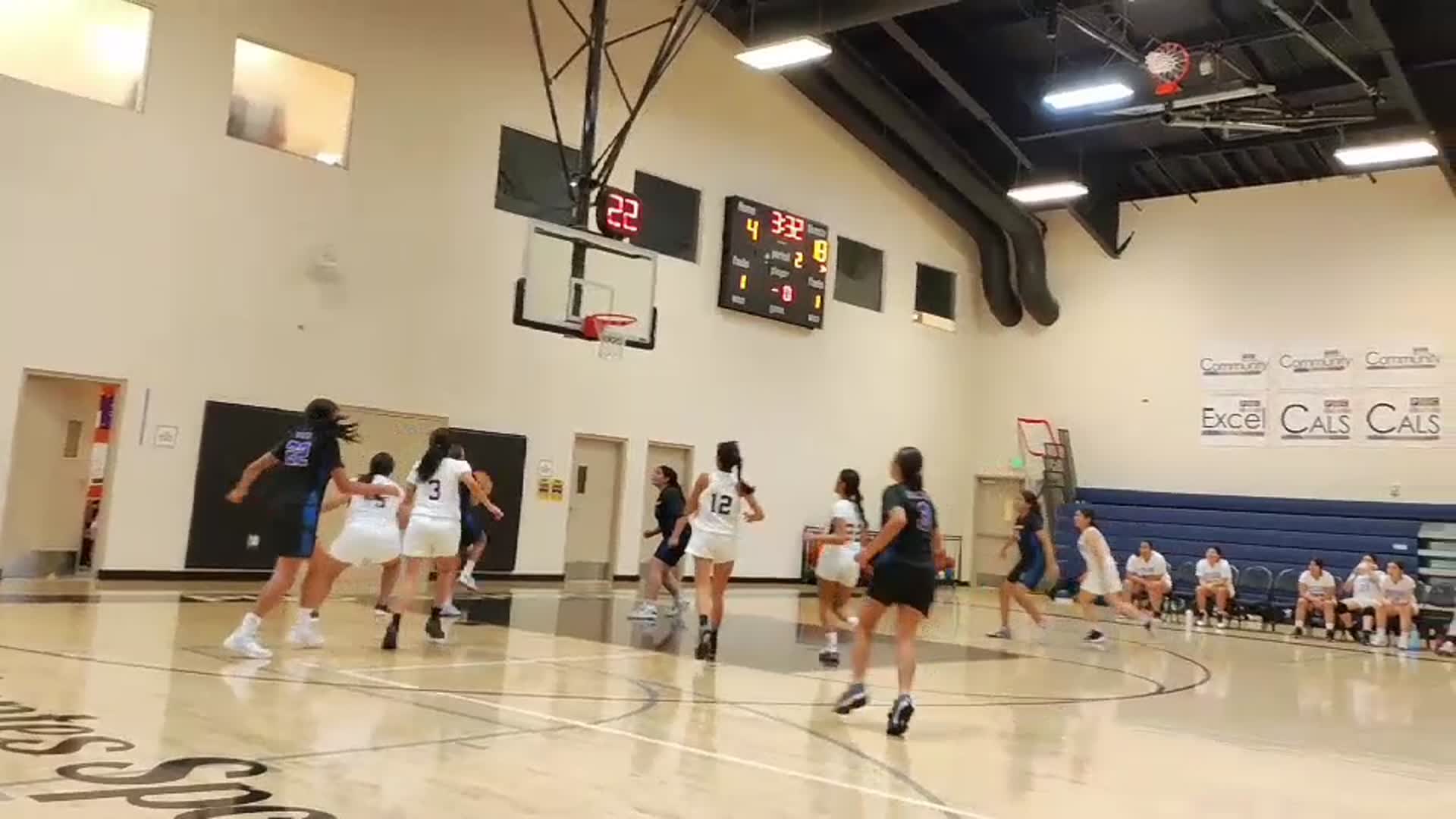 Evelyn Quinonez with the sharpshooter pass to Aylani,  Liliana Word with the screen and Aylani with the lay up.