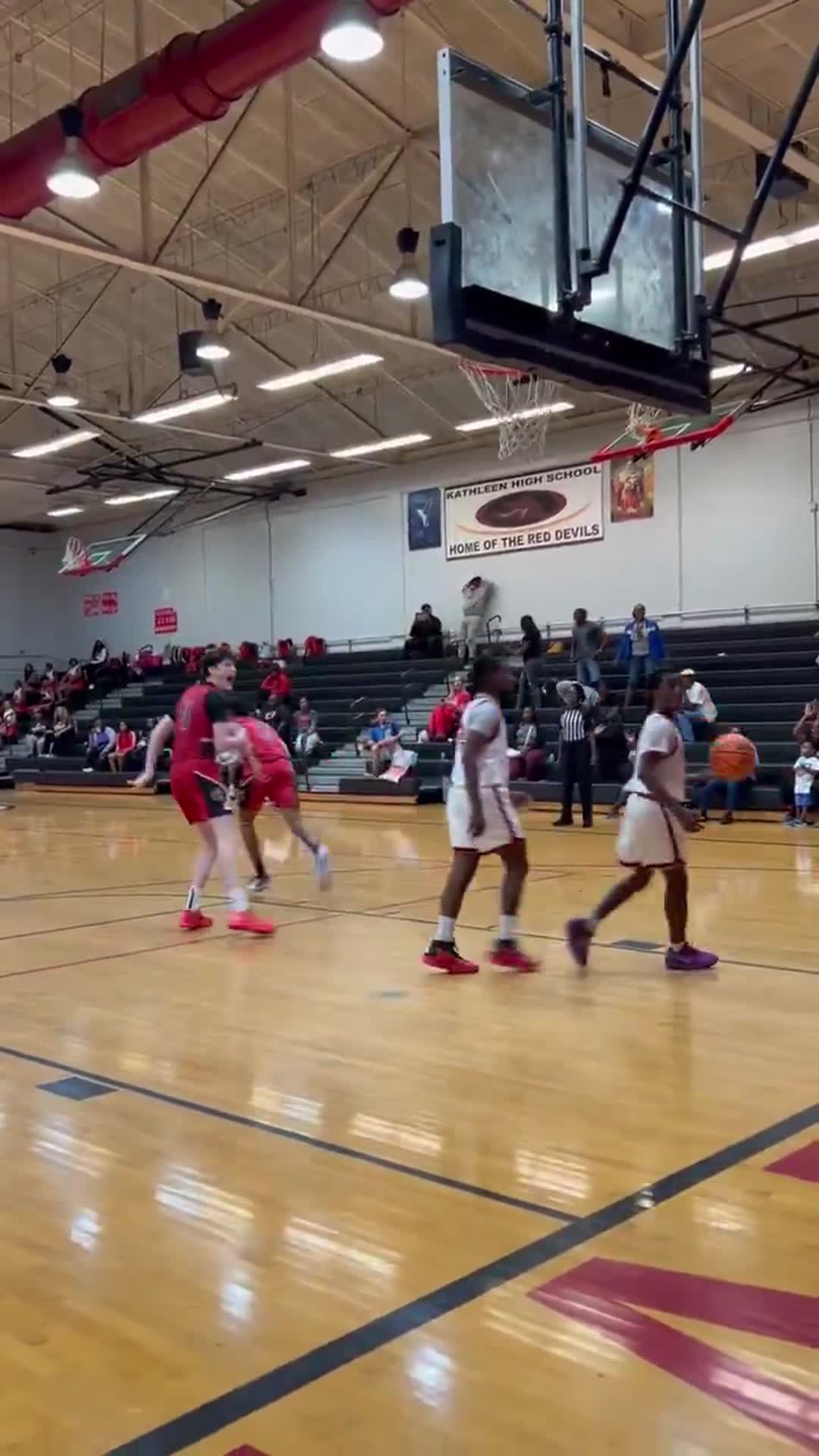 Jeremy Nixon putting down the between the legs alley-oop from Eric Dailey