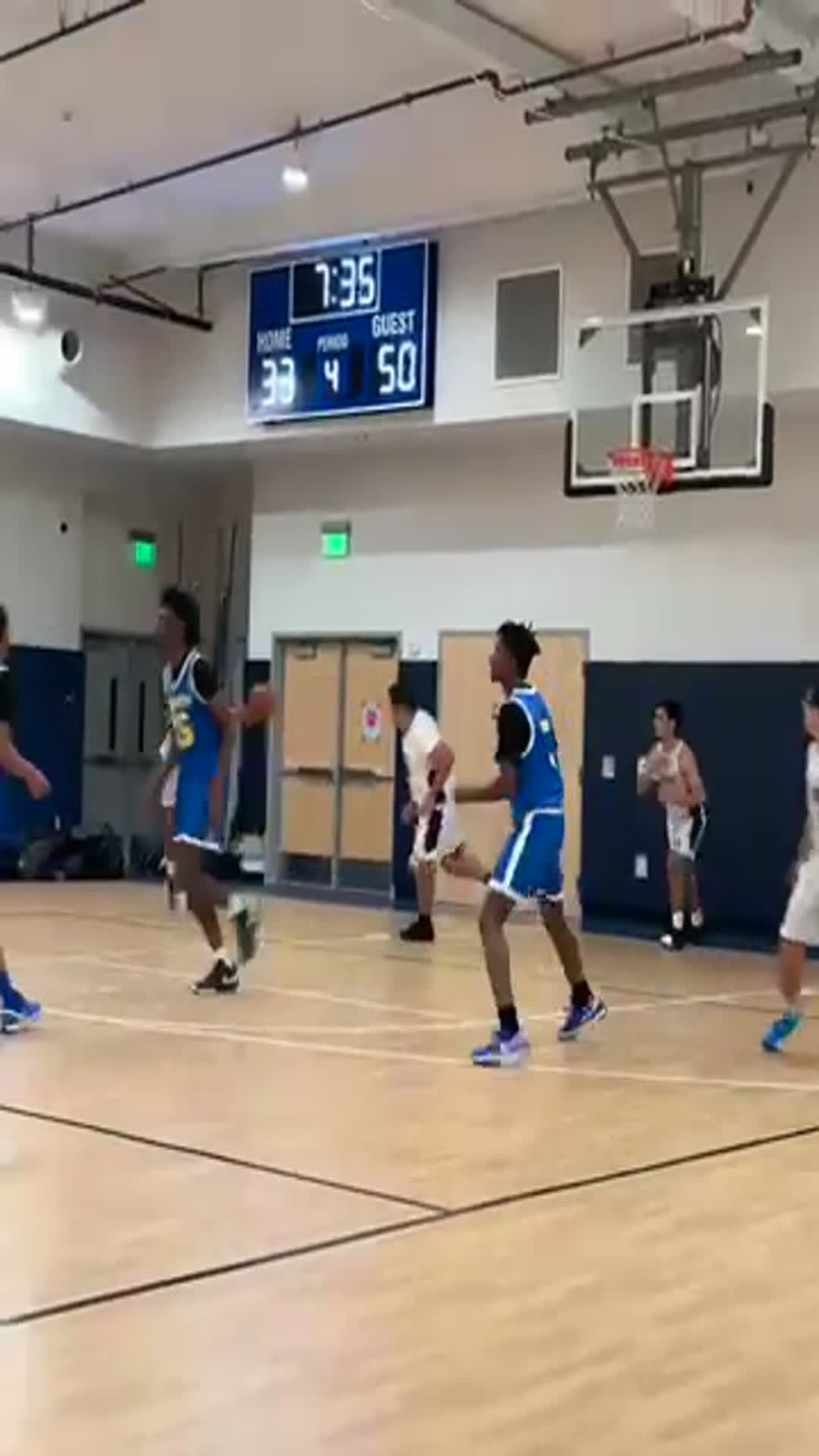 Jaydin Smith (S) with a dynamic rebound and finish.