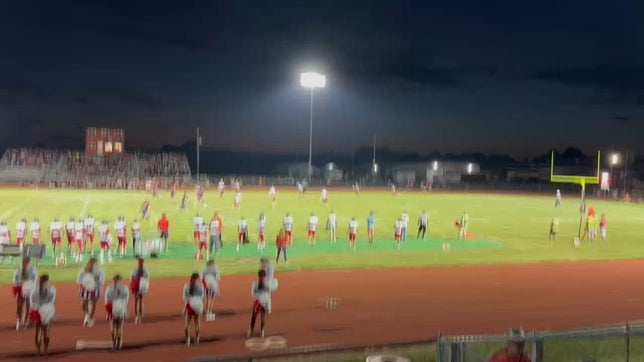 Brennan receives the kickoff, breaks away from a defender and runs it all the way back for a touchdown.