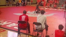 Escape to submission by javoris Pettway of Mary g.Montgomery highschool black and blue singlet