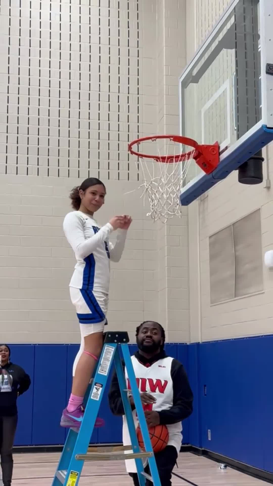 Clara Williams #5 cutting down the net