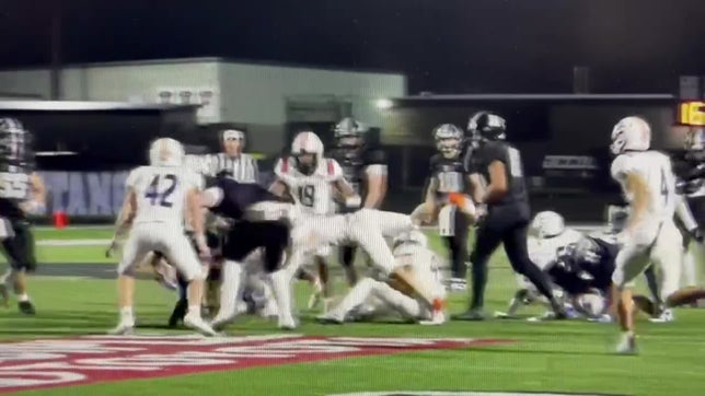 Brennen Odle running the ball against Dickson County High School.