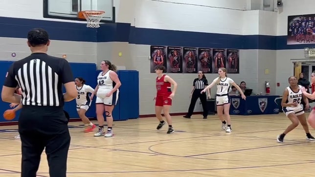 Addison Soles scores in the lane for two of her eight points Tuesday at East Wake Academy.