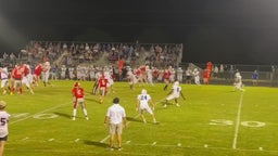 Eli Willard carries the ball against Midway