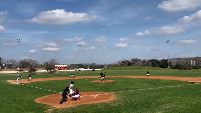 Hitting a double against Alief Taylor