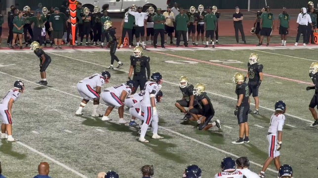 Miles Vinson #71 throws key block for an Olympian 1st. Down