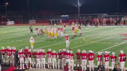 Yelm Defensive pressure by #32 Kenji Scalon tackle for a loss