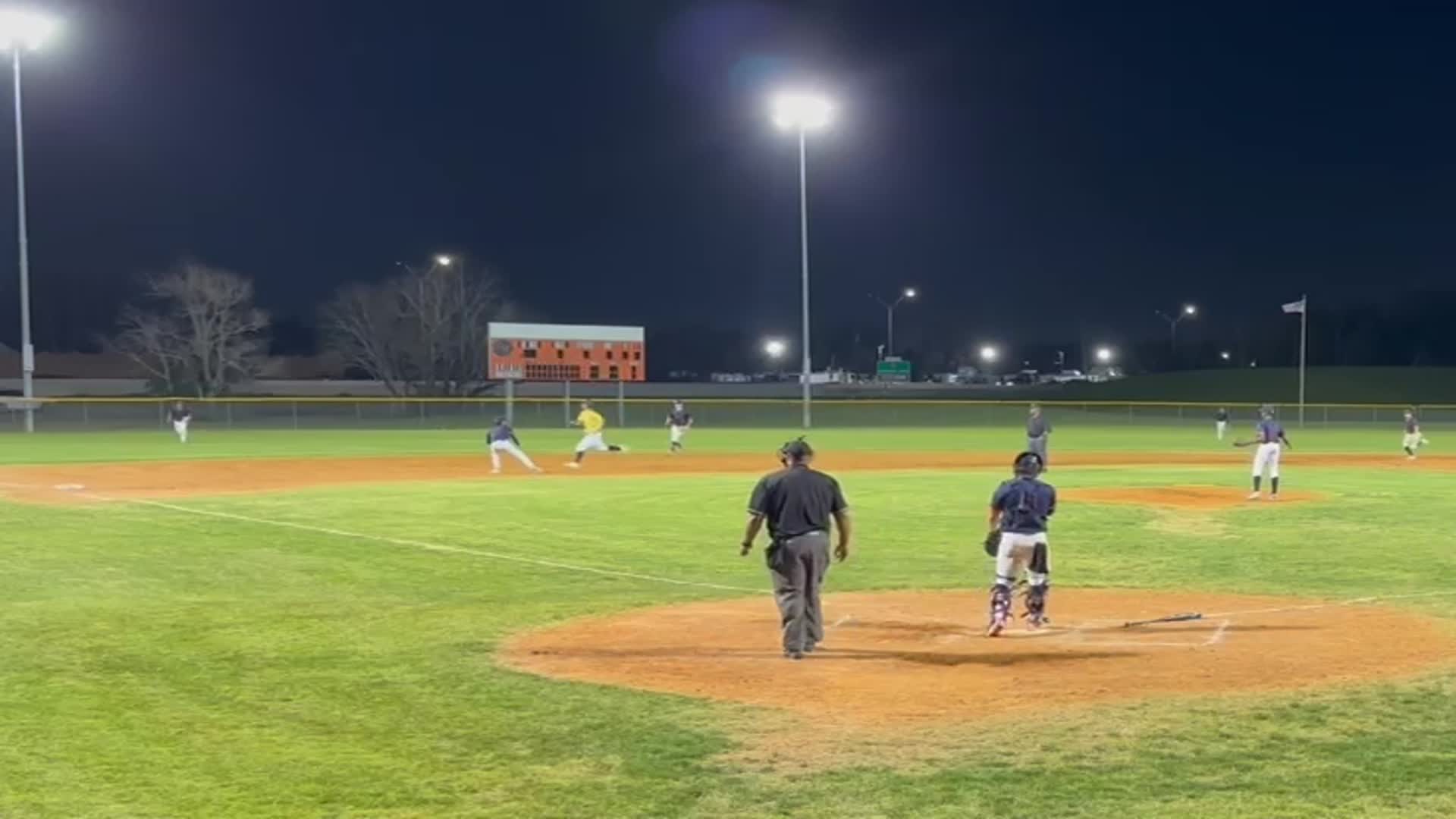 Anthony Flores catches a runner going to 3rd