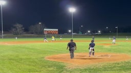 Anthony Flores catches a runner going to 3rd