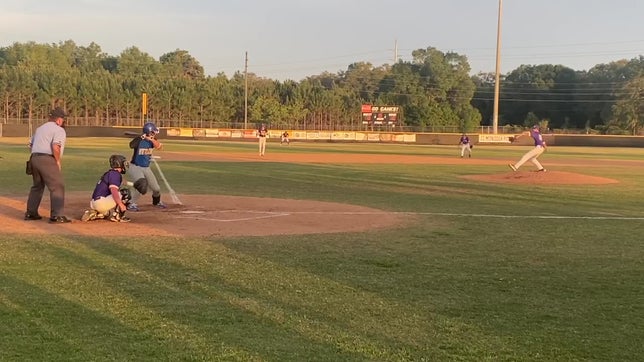 C. Wilson ('25) drills an opposite field single, one of his three hits on the night.
