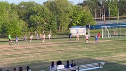 Gabby Graham launches one over the GK for the score