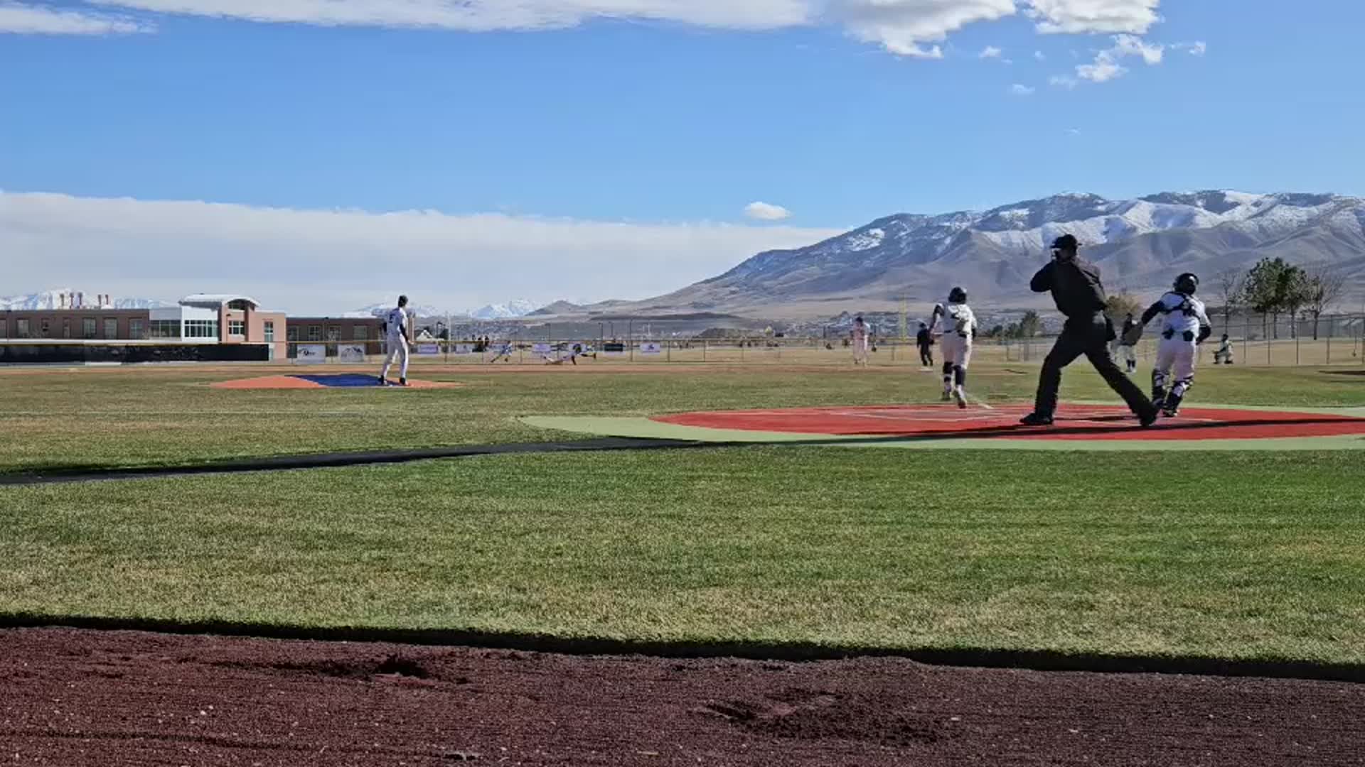 Joe pitching.  Sweet play by Second Baseman