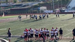 Tigers QB #9 Tama-Satoa Numera runs the ball for a gain in yards