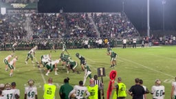 Titan Smith tackling the running back for a loss