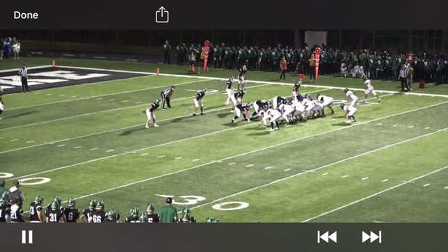 A high point catch in the end zone.