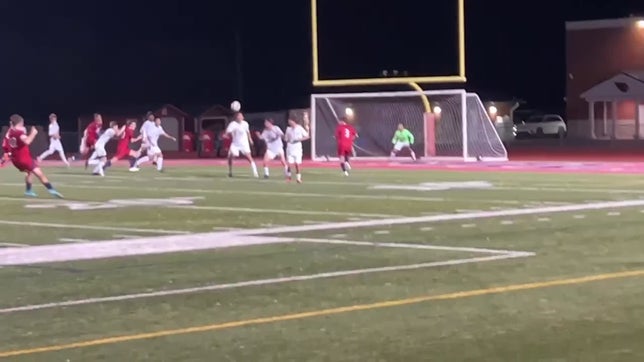 Landon scores the goal on a free kick.