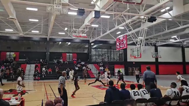 Dooney Johnson dunks during championship game