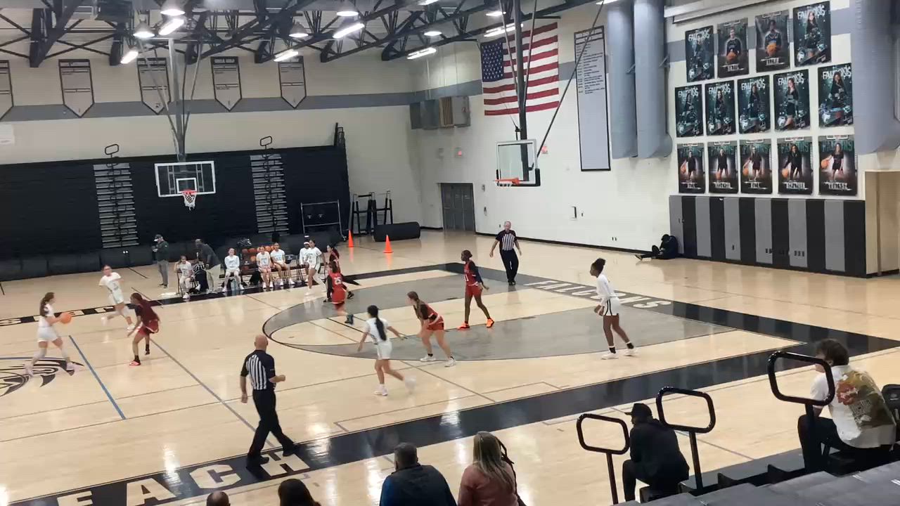 Danielle Bell drives for layup