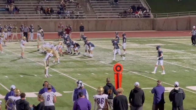 Ash Price chases down the QB.