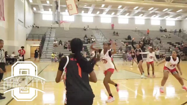 Chloe Crawford 6 ft guard/forward draining a 3pt basket.