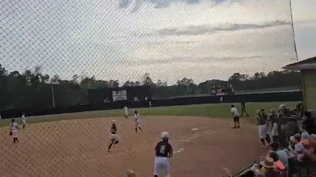 Junior #8 Carson Browning smashes a solo homerun over the centerfield wall.