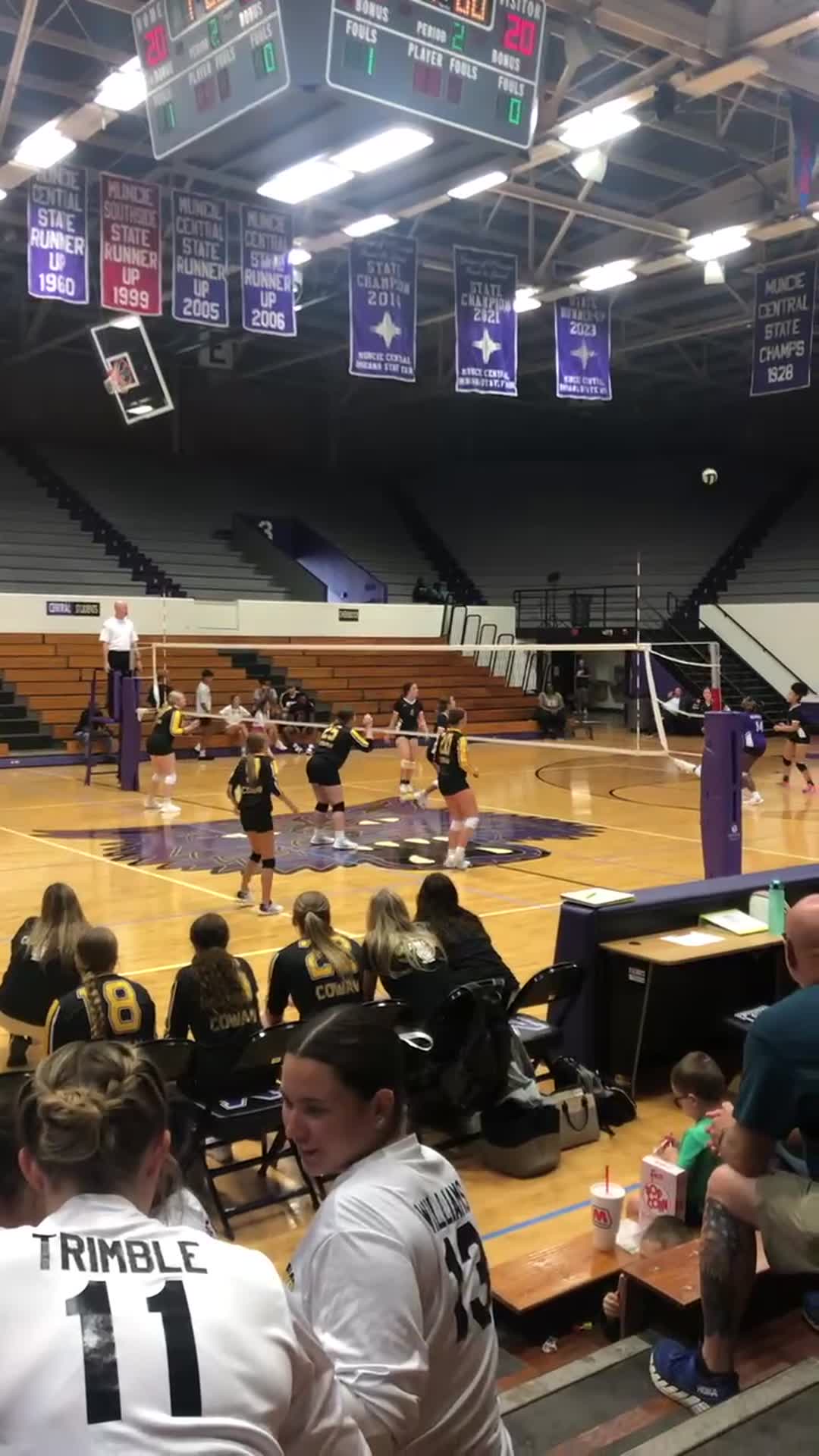 Eowyn Glaze (#6) serving for Cowan and digging a hit by Muncie Central on September 3, 2024.