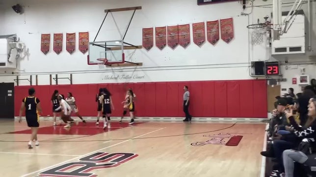 A great pass by London #22 and Kennarah #31 puts it up in the basket.
