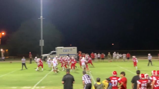 Trick play! The ball is snuck into Ozzy Martin #1's arms as he runs through the chaos and in for a couple yards closer to a TD!