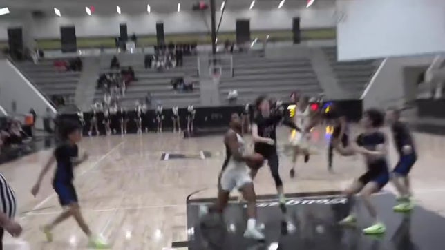 Aaron grabs the rebound, speads coast to coast, and throws down a powerful dunk as the entire gym jumps to its feet, screaming.