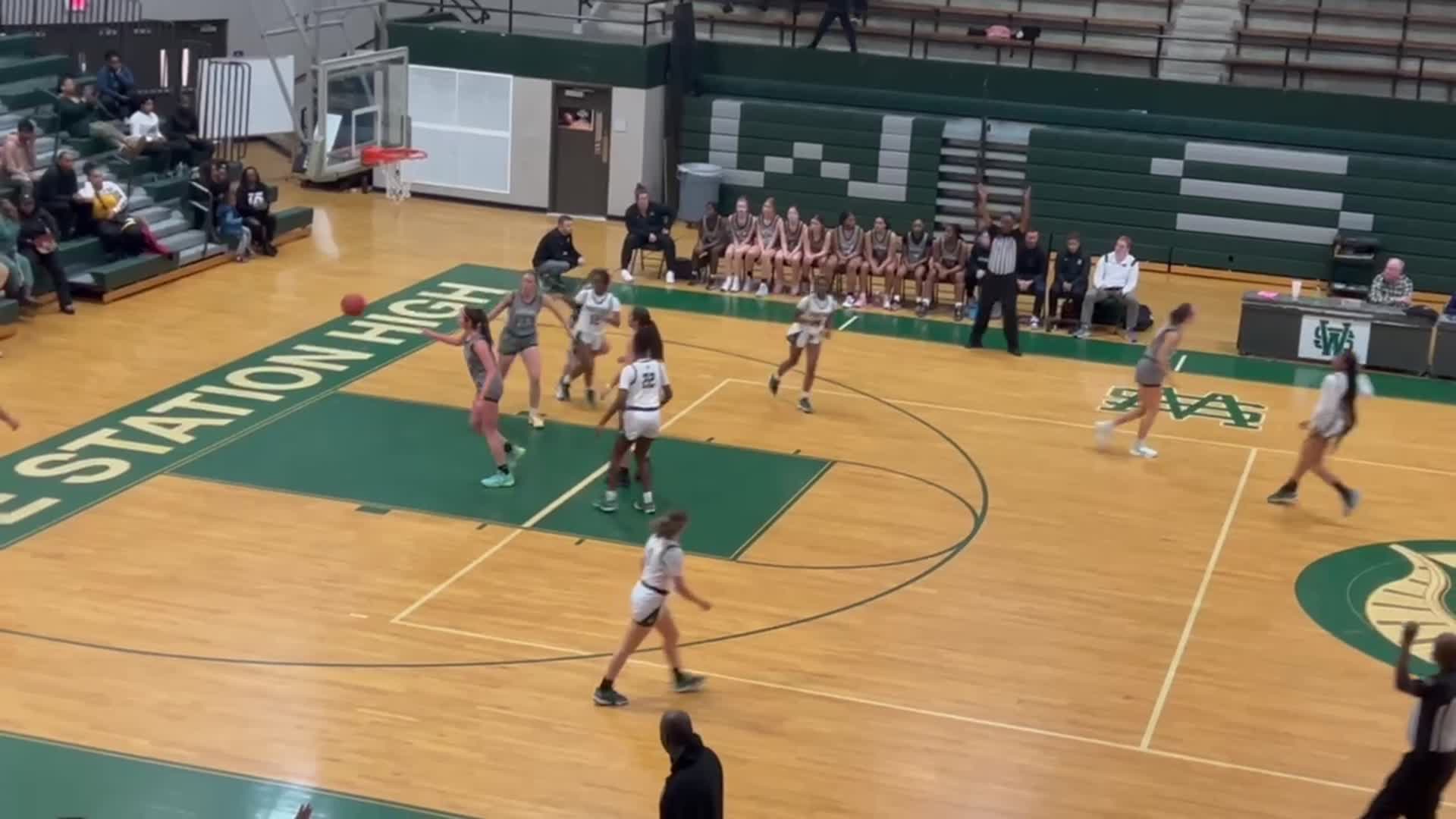 3 point  basket by Kendall Reynolds.