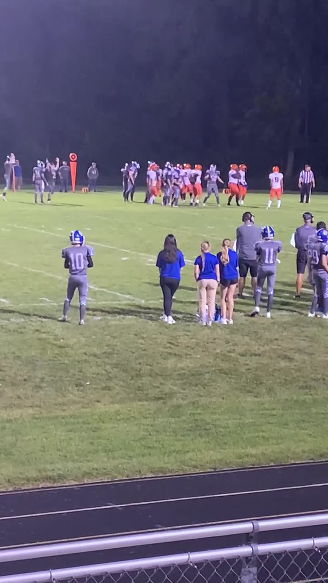 Johnny Bobos kicking field goal