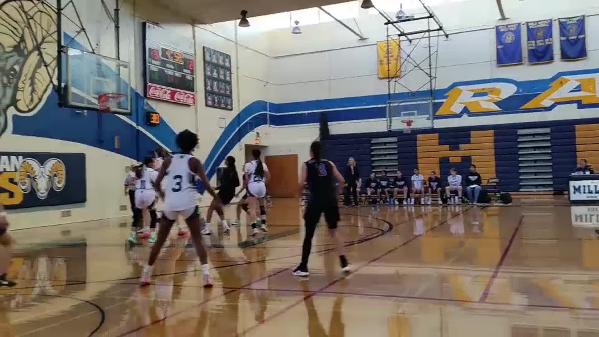 Evelyn Quinonez with the 3 pointer