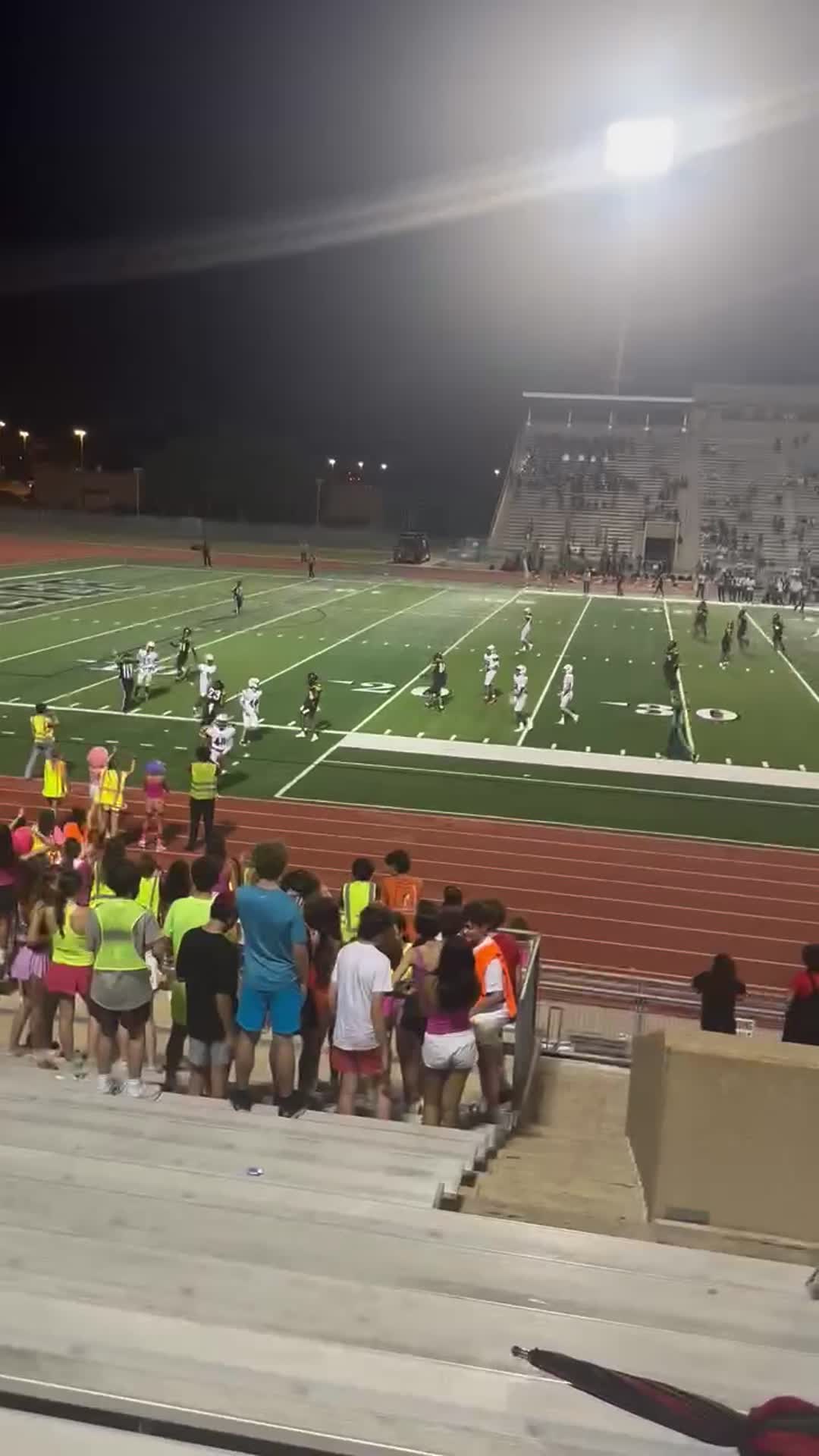 Kristopher Connor 42, complete a tackle stopping a touchdown play.