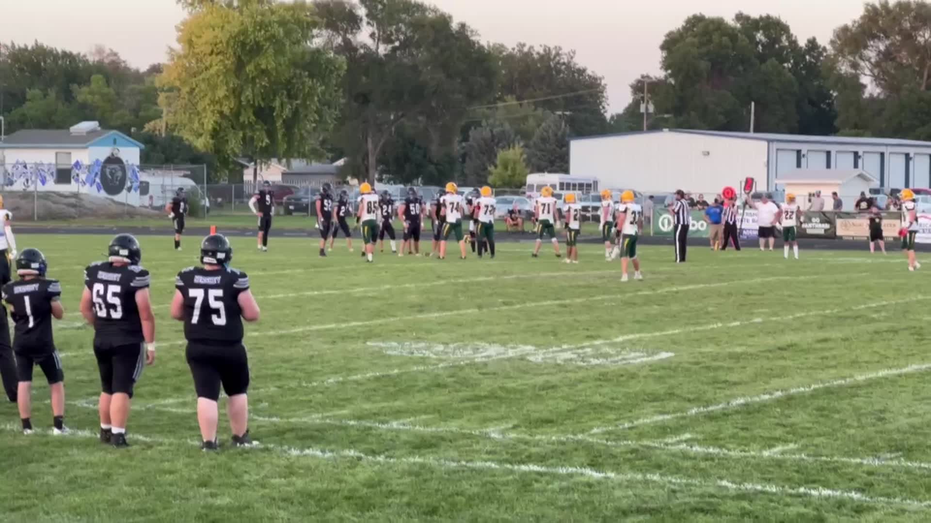 Kearney Catholic Freshman, #72, Javier Copley, pancake tackles Hershey Sophomore, #50, Jaydon Parker on 9/1/2023.