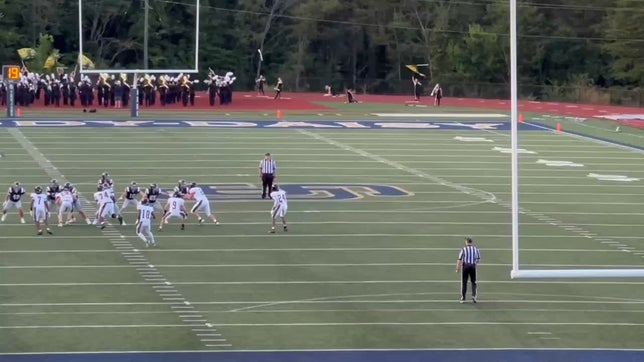 Hollis climbs the ladder and is able to keep the ball from hitting the ground on a deep ball.