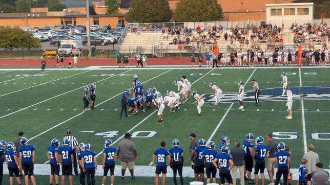 Gavin Chapman #17 breaks through to make a Harper Creek touchdown against Pennfield
