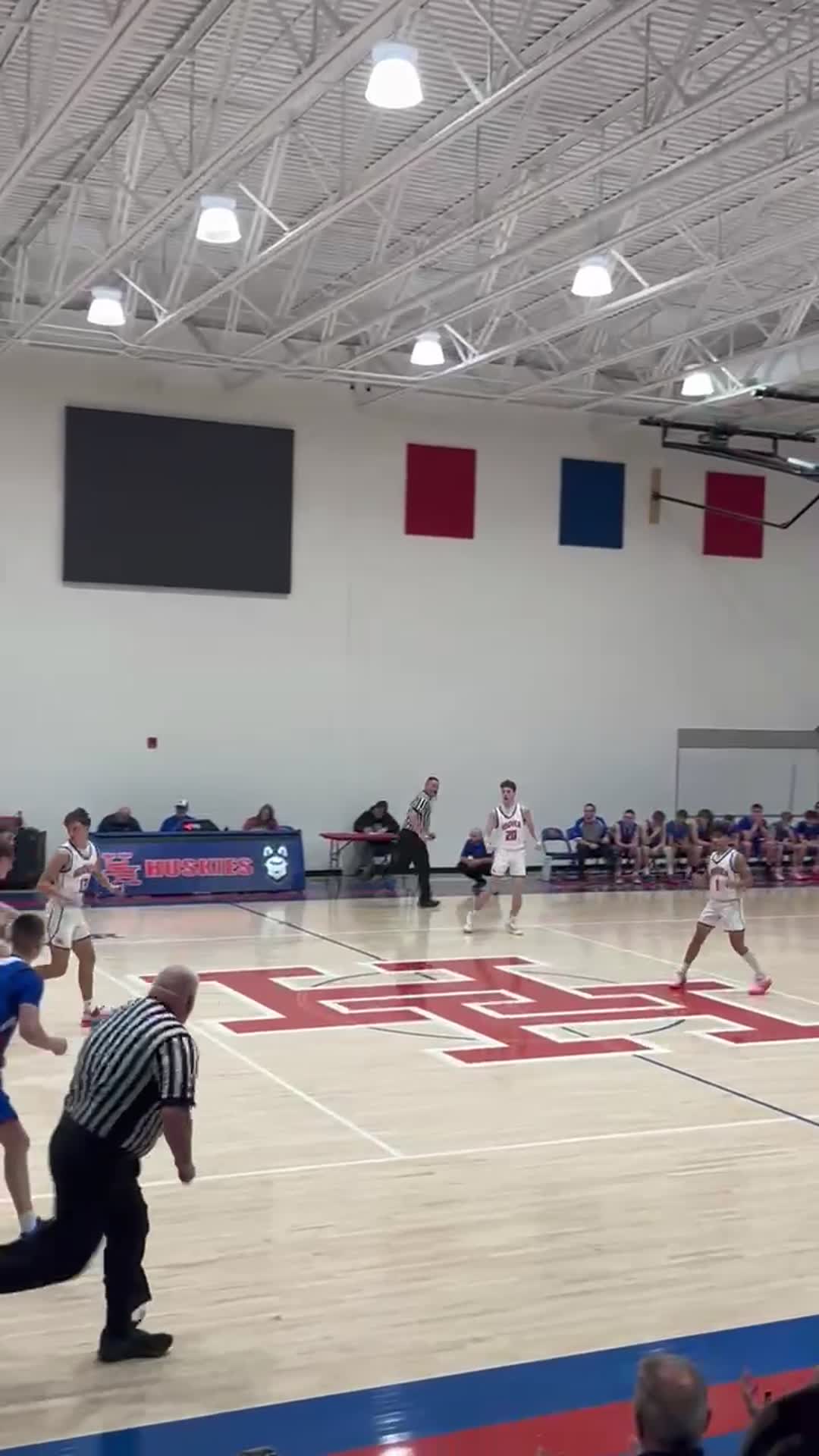 #20 Senior Kyle Adkins makes a 3 pt shot against Midland Trail during Hoover's senior night.