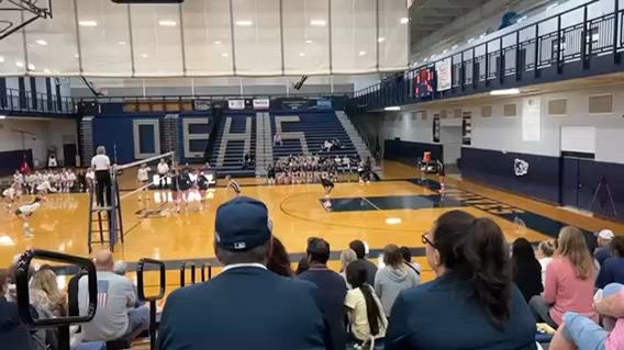 Riley serving and setting to Ally Coy for the kill against Waubonsee Valley HS